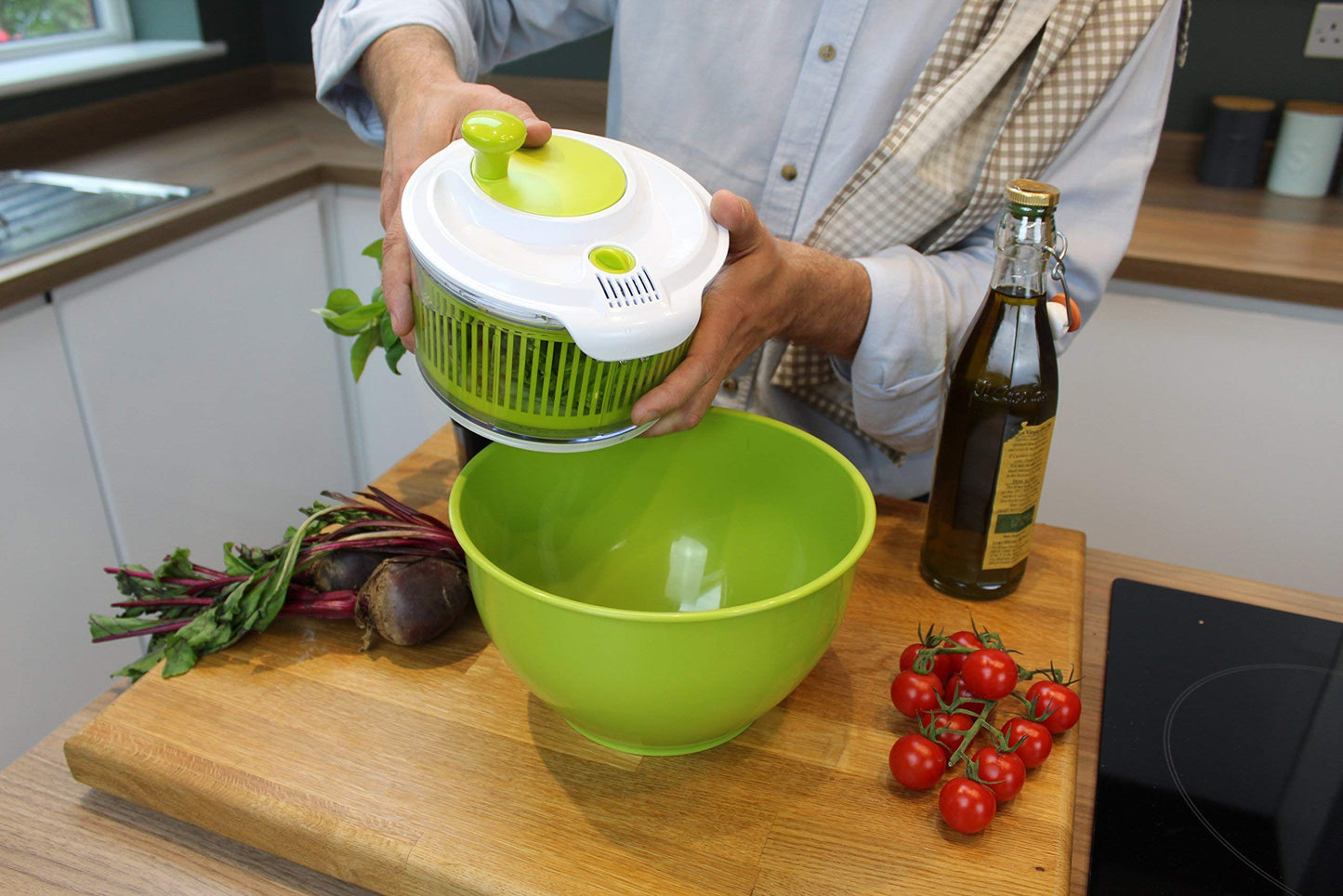 Small Salad Spinner with clear serving bowl, colander basket, smart-lock lid, easy drain system, non-slip base. 16cm|6in diam. Washes, dries & dresses lettuce, herbs, vegetables & fruit. Compact.